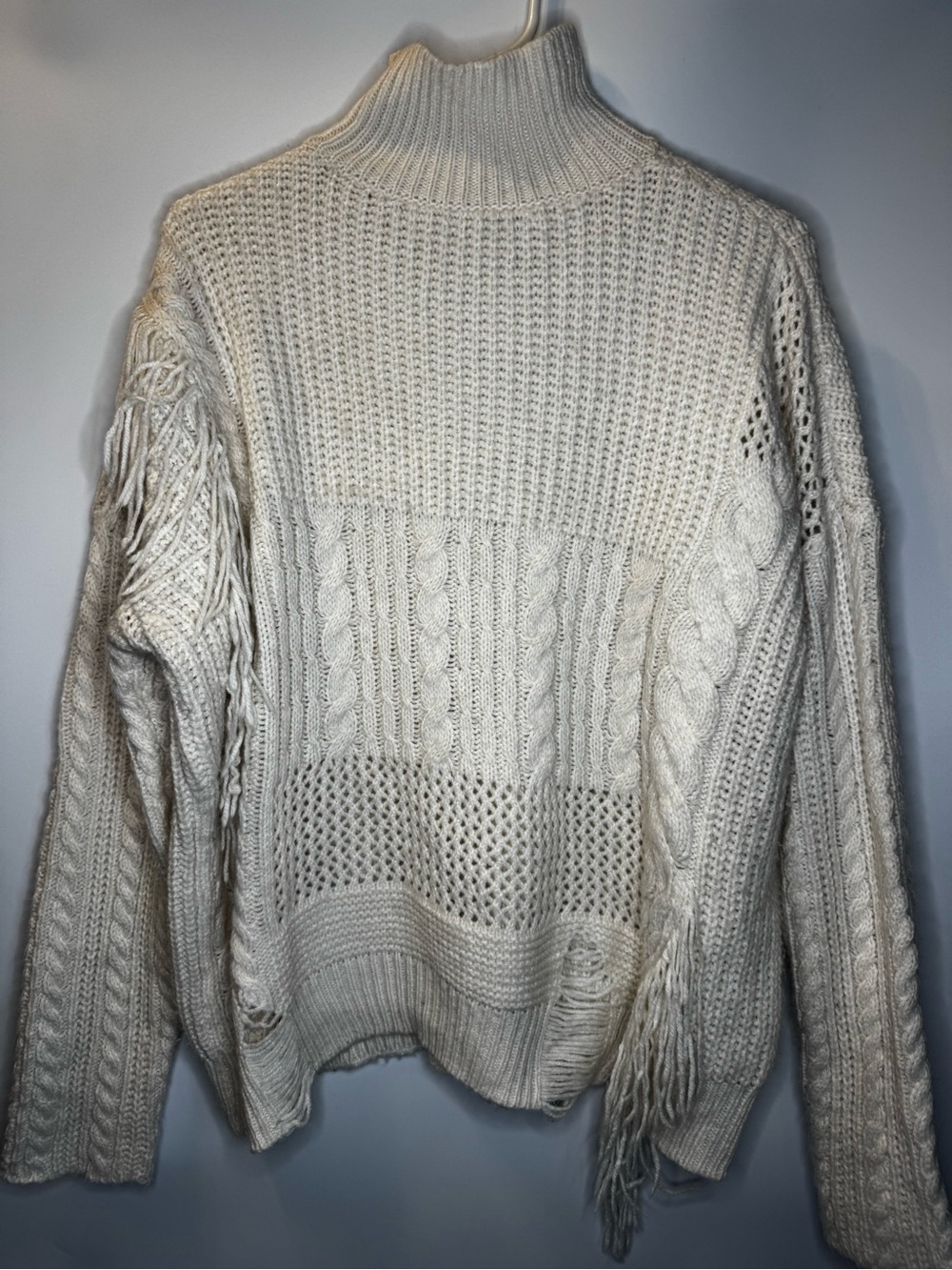 Cream Cable-Knit Turtleneck Sweater with Fringe